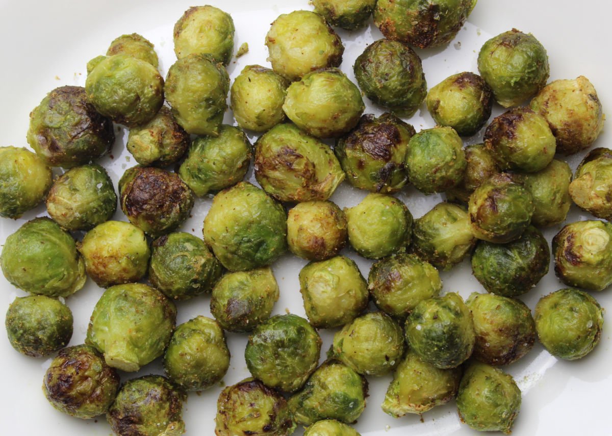Frozen brussels sprouts that are slightly charred and carmelized from the toaster oven.