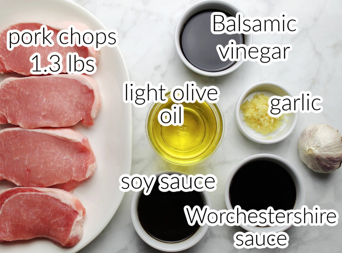 Ingredients for pork chop marinade includes 4 pork chops, light olive oil, balsamic vinegar, soy and worchestershire sauce and fresh grated garlic.