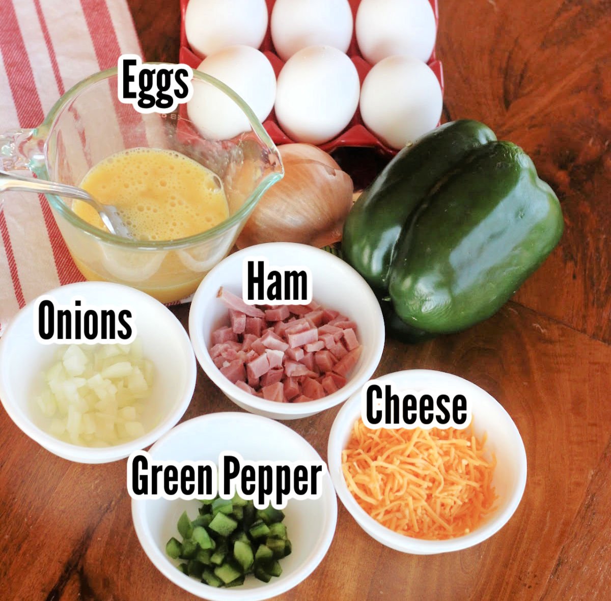 Western Sandwich ingredients including eggs, onions, ham, peppers and cheese.