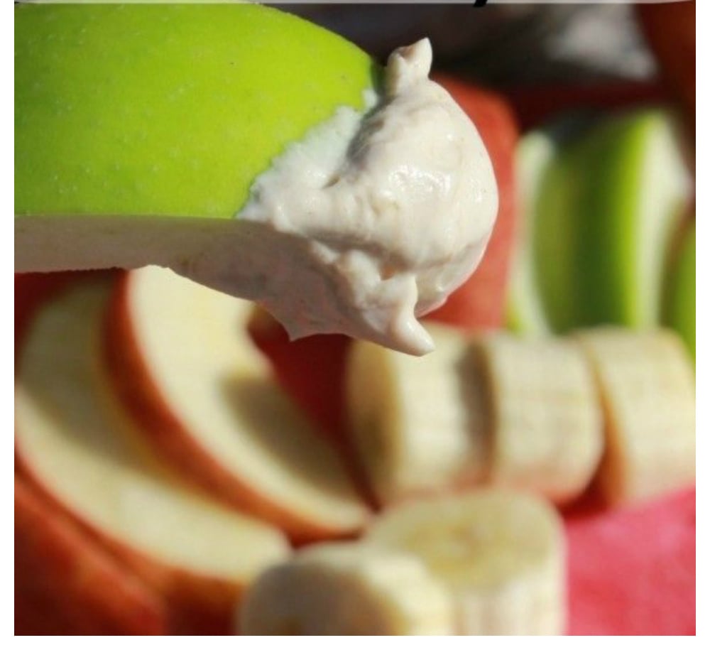green apple slice with peanut butter cool whip dip.
