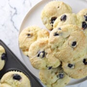 Blueberry Yogurt muffins stacked on a plate