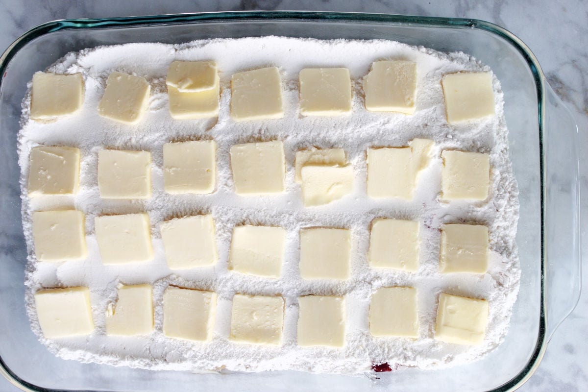 Thinly sliced butter on top of cake mix layer.