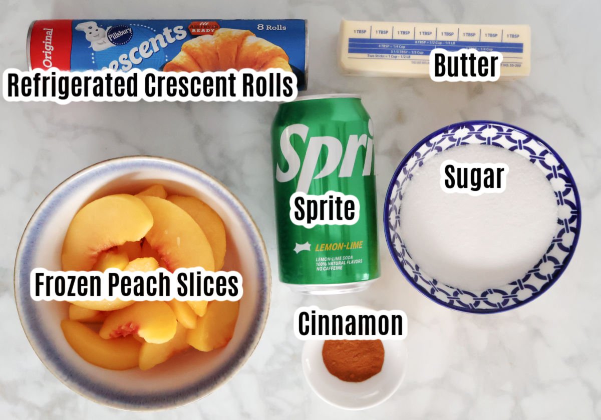 Peach dumpling ingredients including frozen peach slices, refrigerated crescent rolls, butter, sprite, sugar and cinnamon.