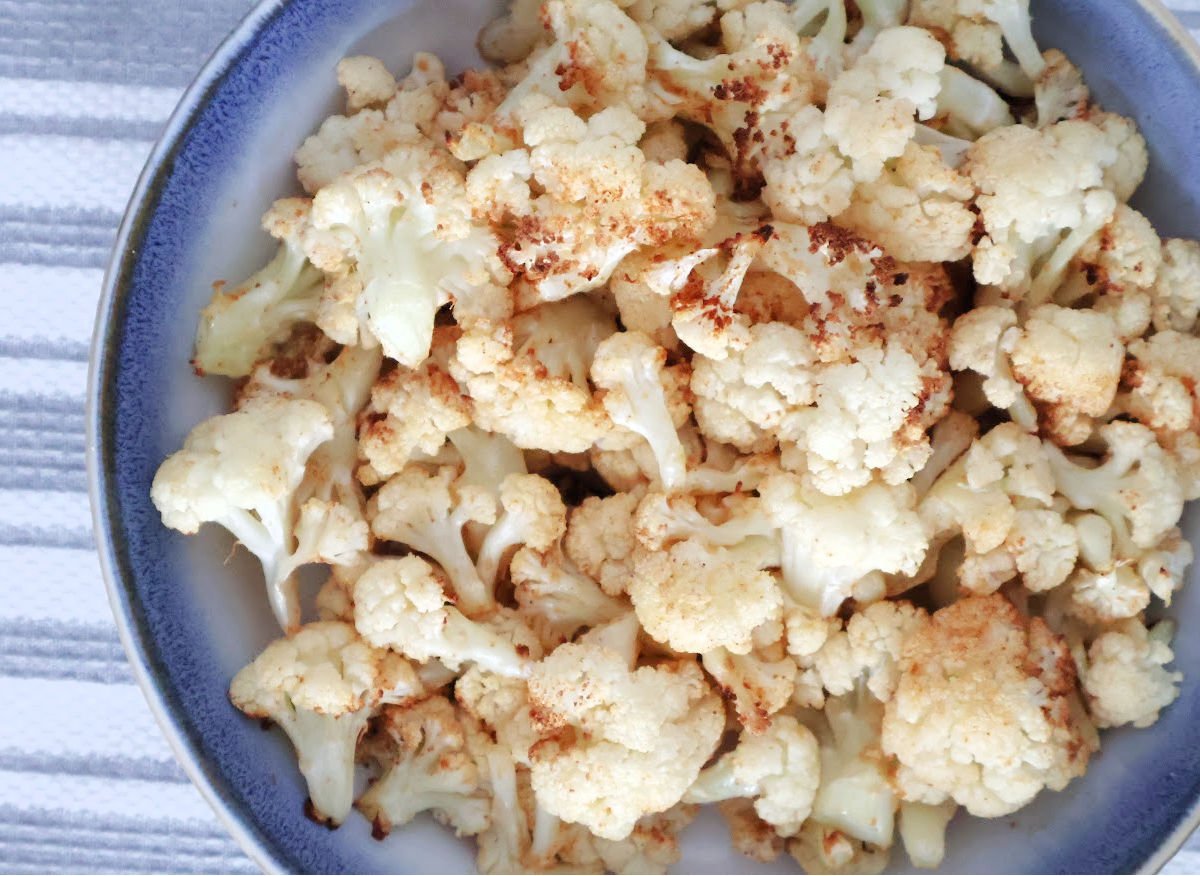 cauliflower florets seasoned and air fried.