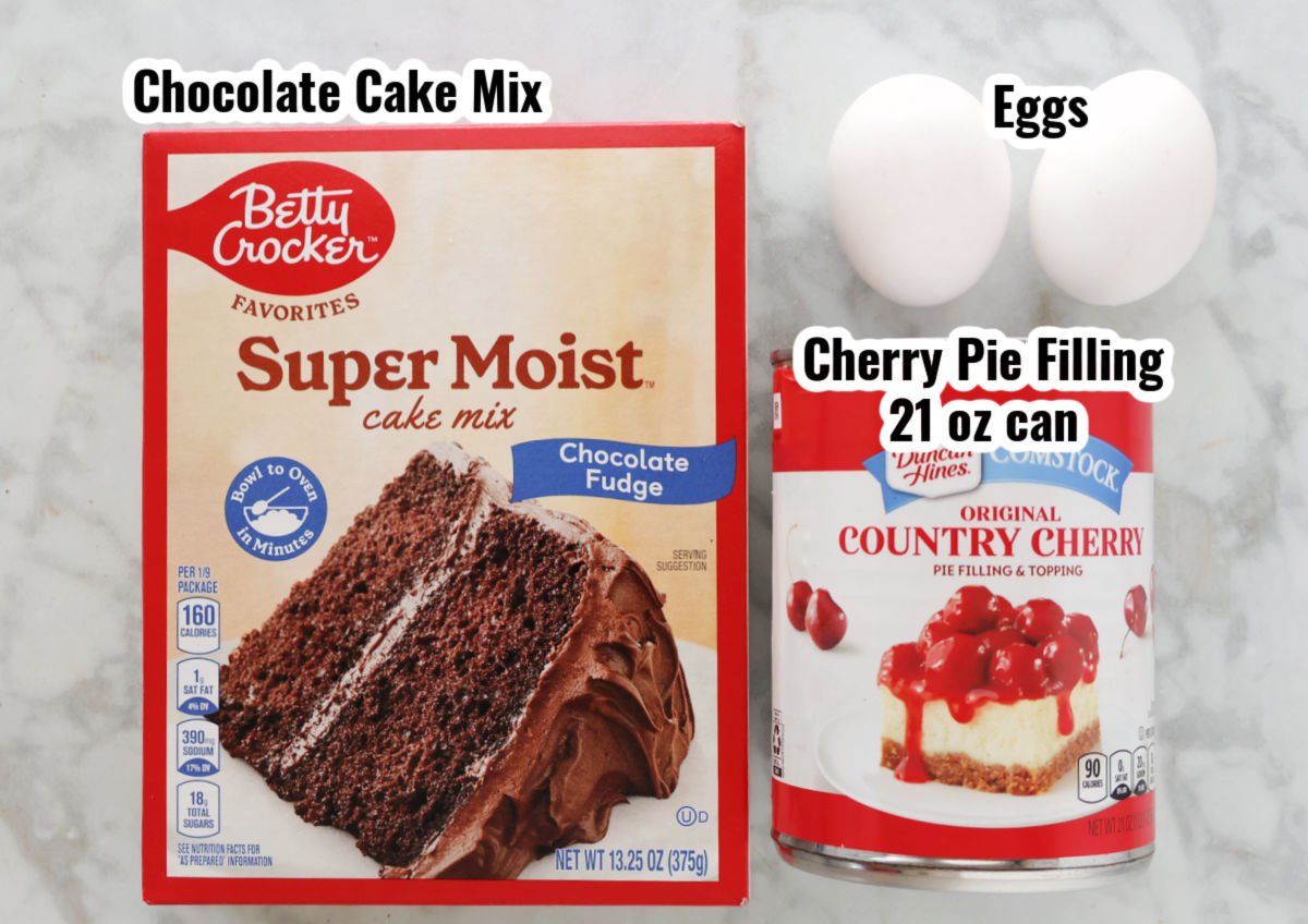 ingredients for three ingredient chocolate cherry muffins including chocolate cake mix, cherry pie filling and eggs.