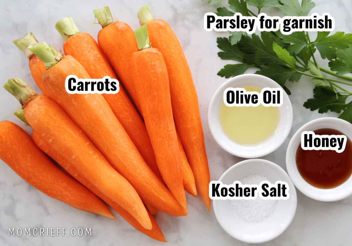 ingredients for honey roasted carrots includes carrots, olive oil, honey, Kosher salt and parsley for garnish
