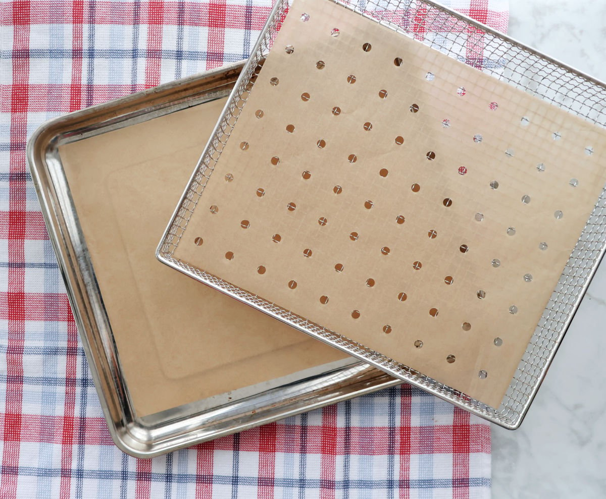 Parchment for air fryer basket (with holes) and tray (without holes).