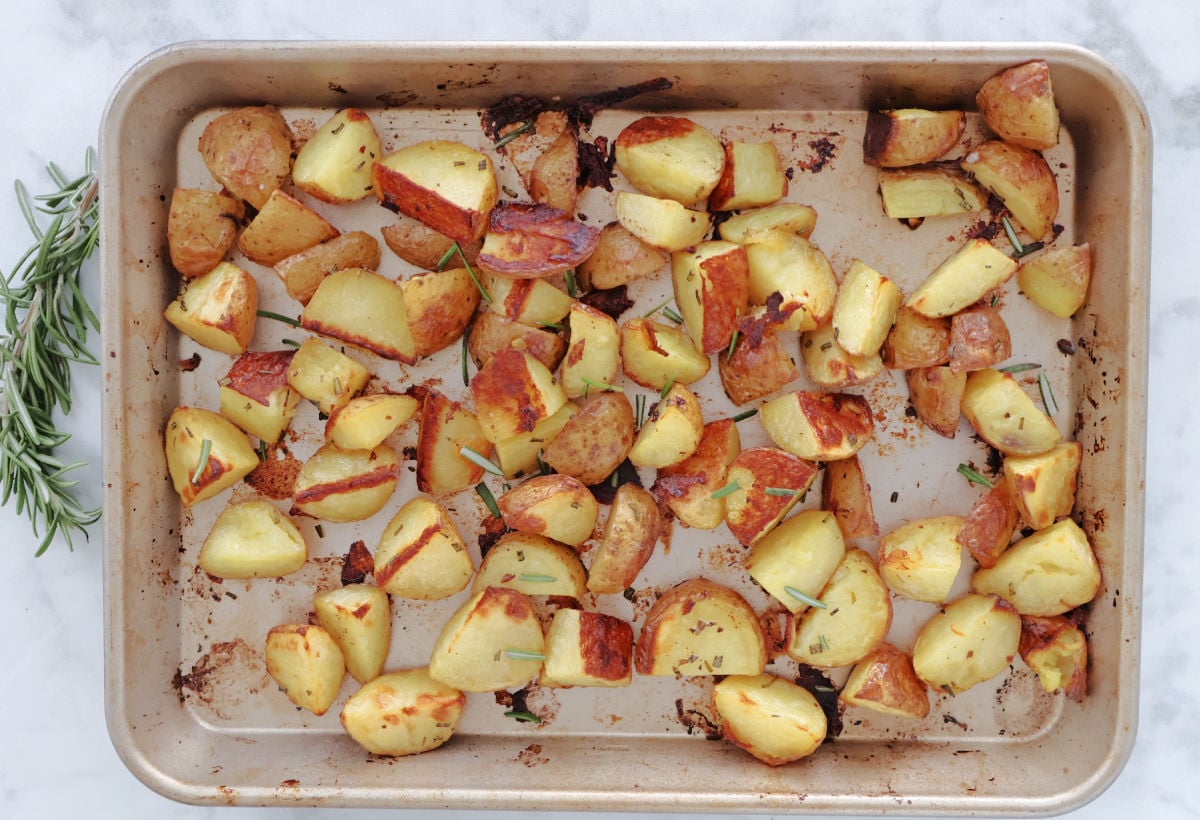 roasted rosemary potatoes on a sheet pan.