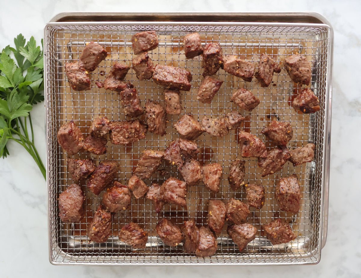 air fryer steak bites are cooked after 4 minutes.