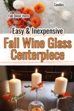 Text states easy and inevpensive fall wine glass centerpiece. Wine glasses are upside down with a small pumpkin in them. On top is a white burning white candle. Orange leaves are spread around wine glasses to pull the look together.