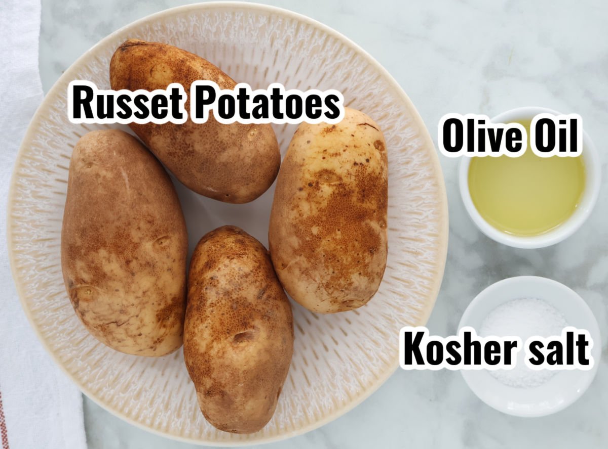 Ingredients for air fry baked potatoes include russet potatoes, kosher salt and olive oil.