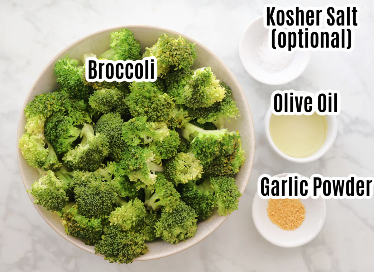 Air fryer broccoli ingredients which include broccoli, olive oil, garlic powder and optional kosher salt.