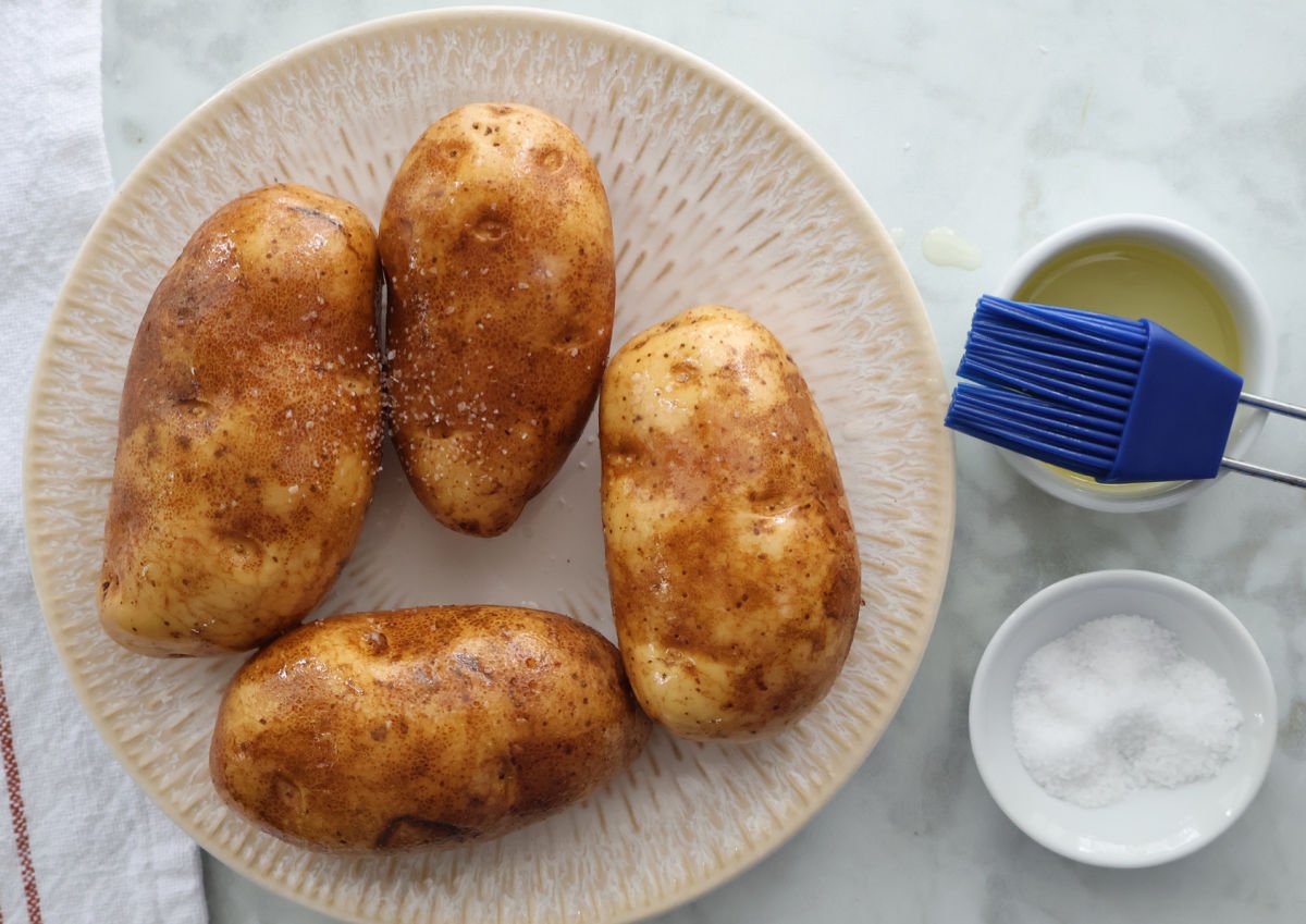 air fryer roasted potatoes covered in a thin layer of olive oil and sprinkled with coarse salt.