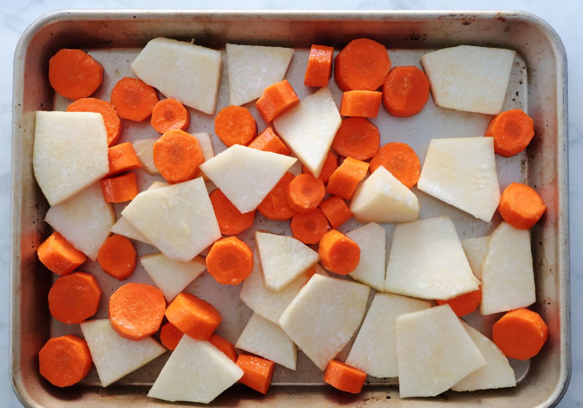 Kohlrabi and carrots on a small sheet pan