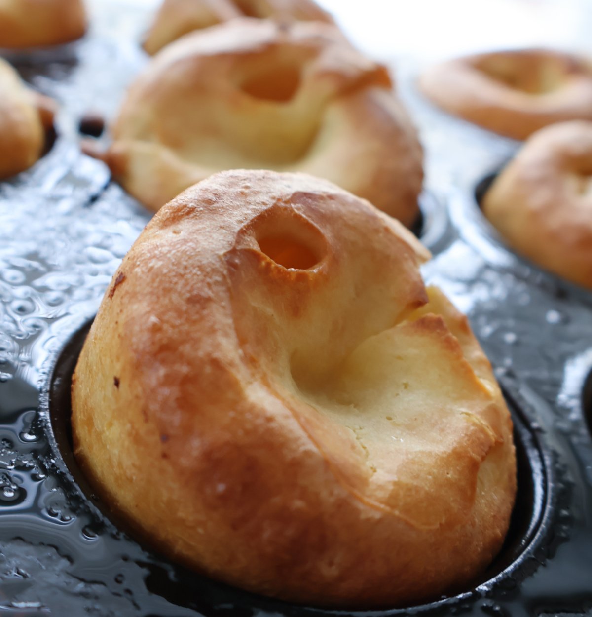 A puffy golden Yorkshire pudding fresh out of the oven.