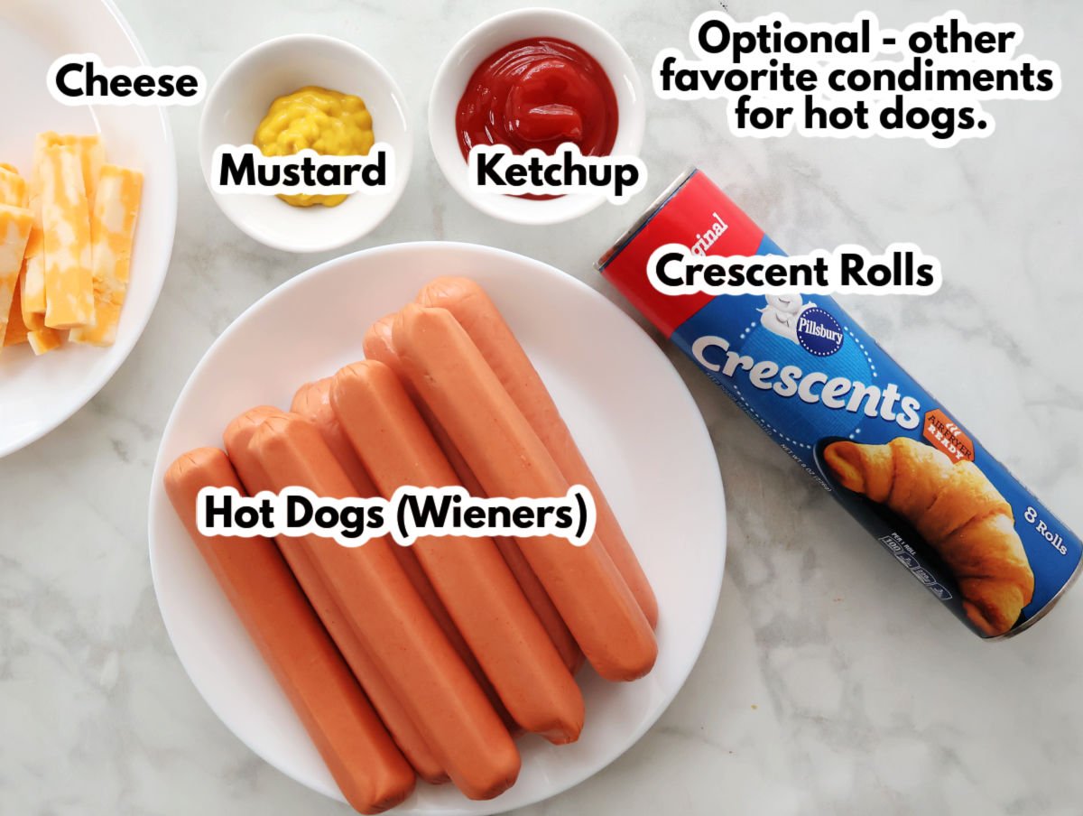 Ingredients for full sized pigs in a blanket. Includes hot dogs (weiners) Crescent Rolls, Cheese but that is optional, and dipping condiments including mustard and ketchup.