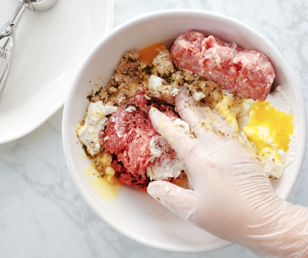 mixing ingredients for ricotta meatballs