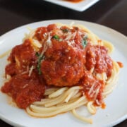 Ricotta meatballs on top of spaghetti