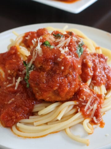 Ricotta meatballs on top of spaghetti