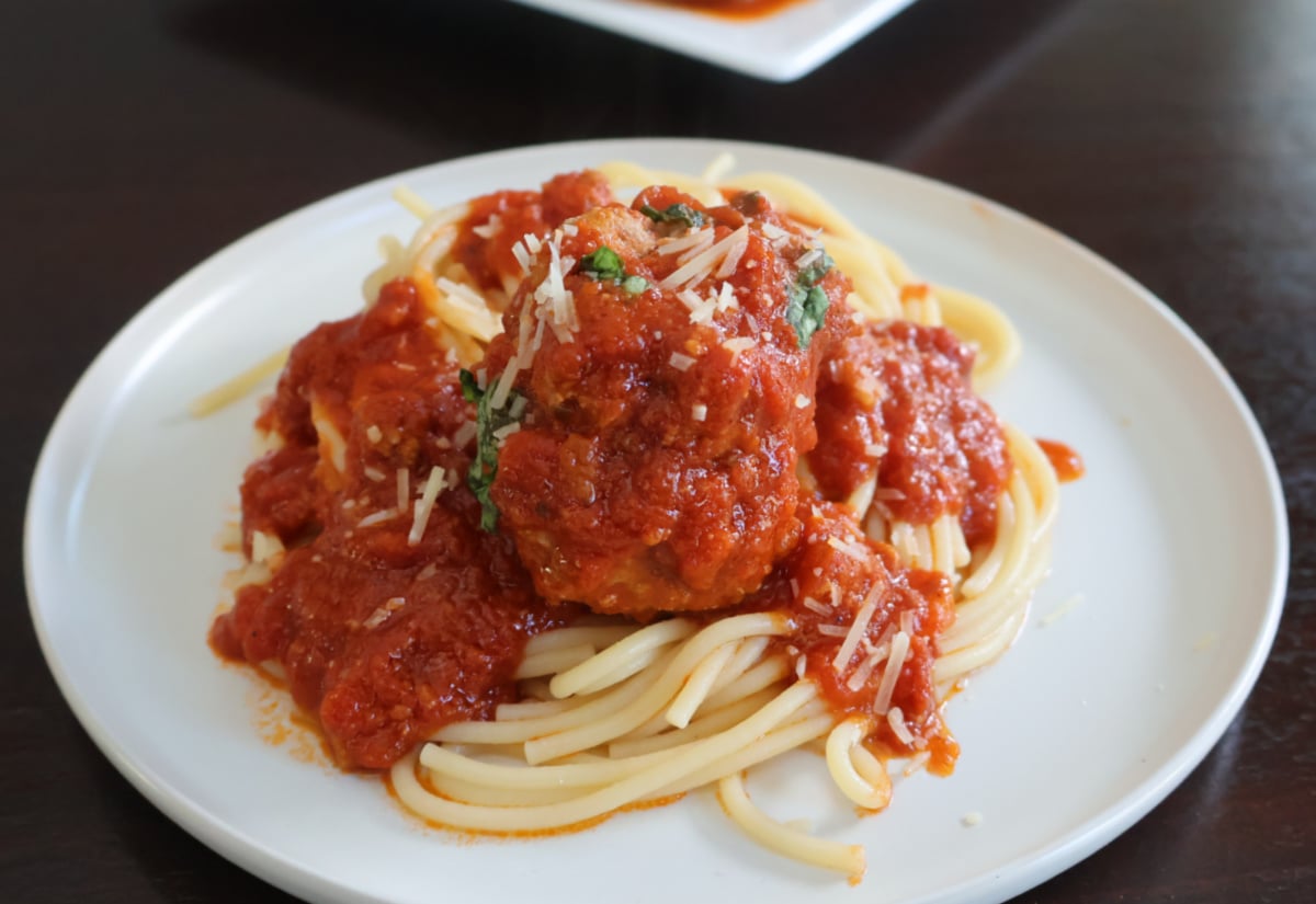 Ricotta meatballs on top of spaghetti