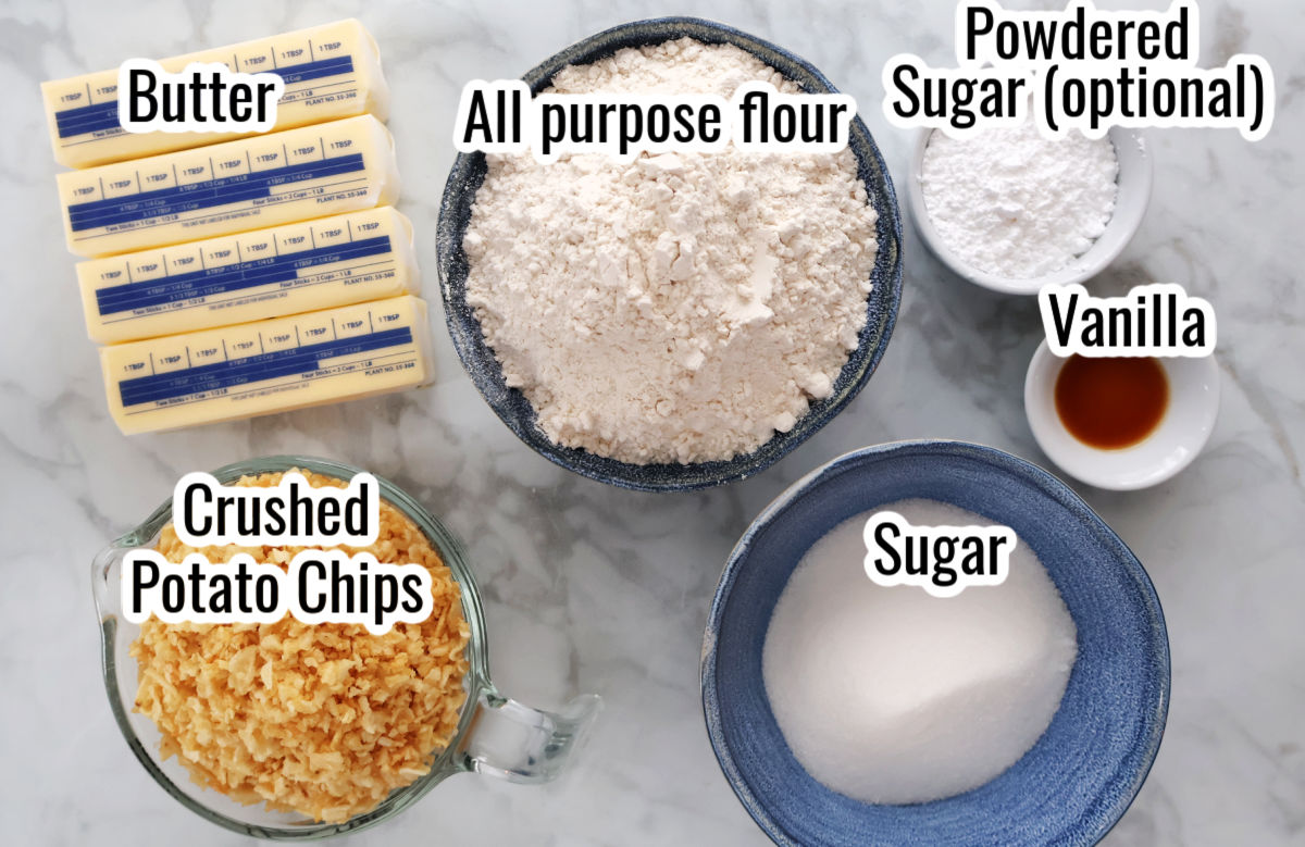 Ingredients for potato chip cookies which includes 4 sticks of butter, crushed potato chips, all purpose flour, powdered sugar (optional), vanilla and white sugar.