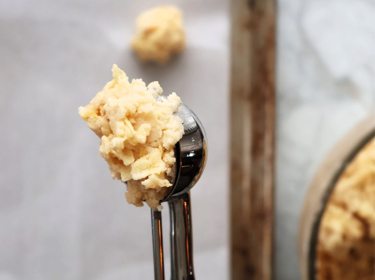 A scoop of potato chip cookie batter to remeasure for the cookie.