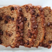 Slices of banana bread made with cake mix and bananas, showing the moist texture and chocolate chip pieces.