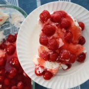 Cherries in the Snow with creamy layers and bright red cherry topping