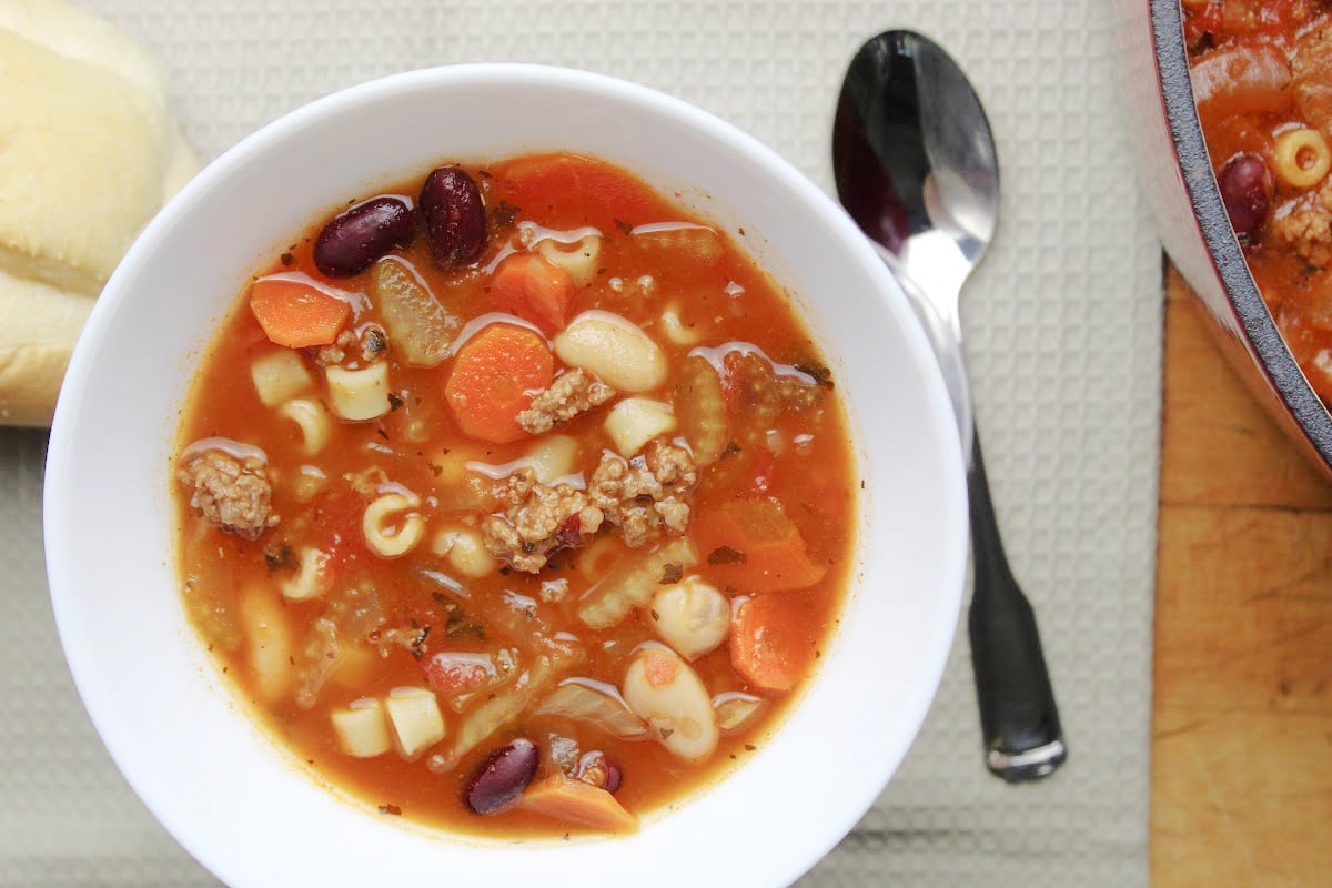 pasta fagioli in a white bowl.