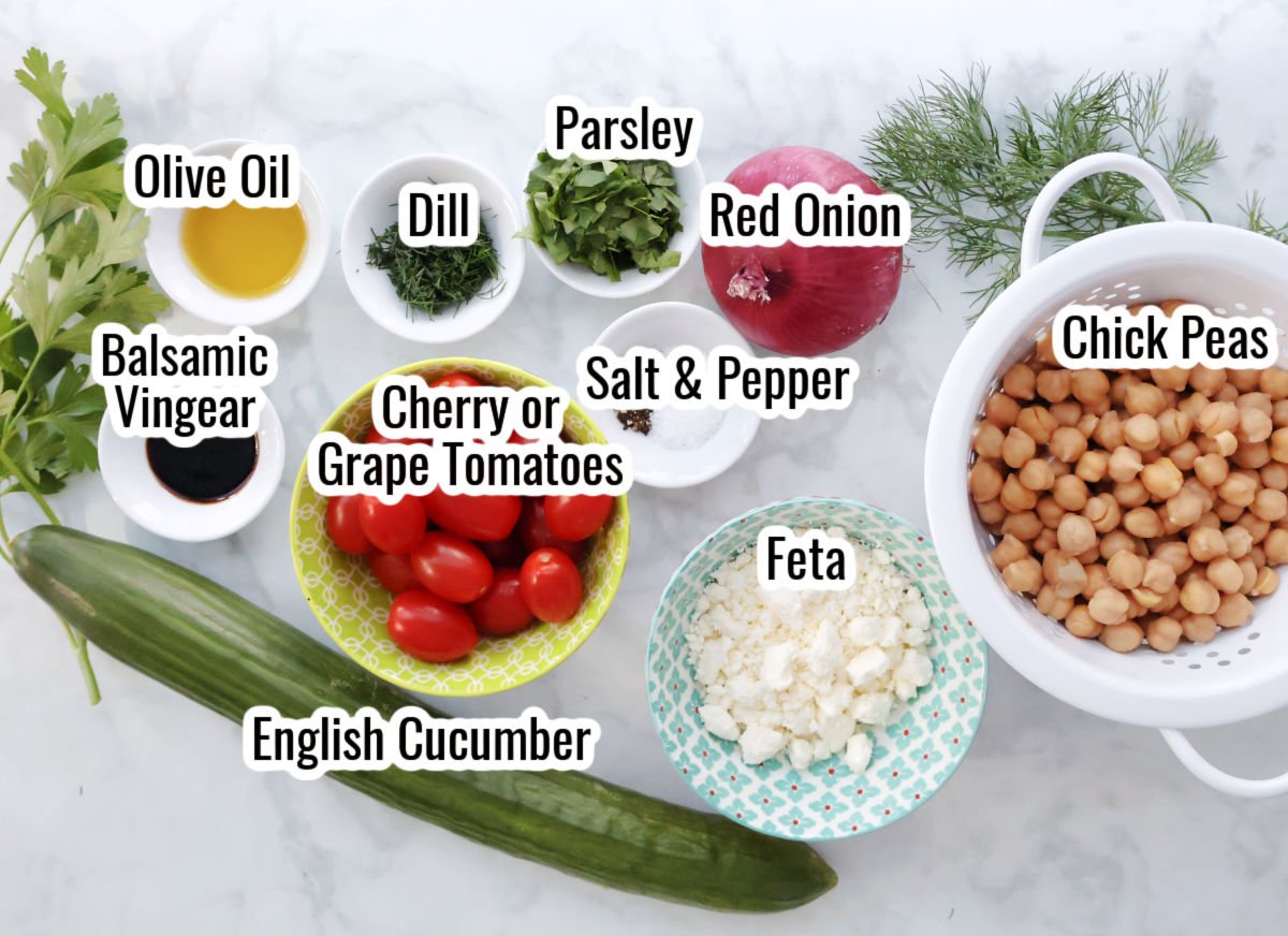 Ingredients for cucumber chickpea salad laid out on the counter
