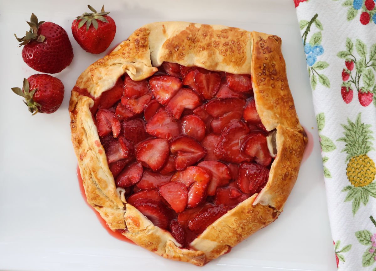 Overhead shot of homemade strawberry galette with crispy edges