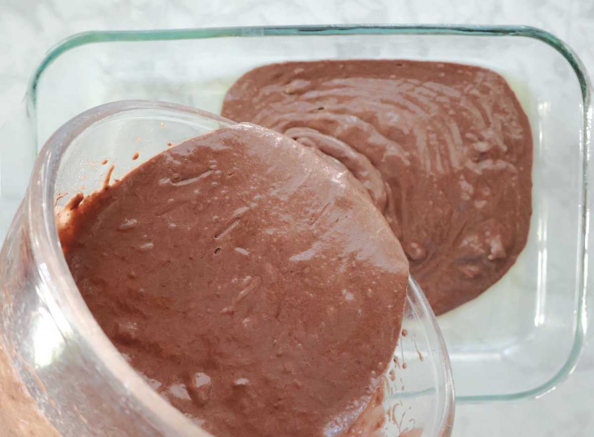pouring Dr Pepper batter into baking dish