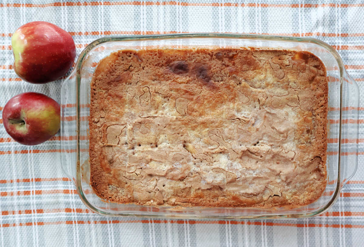 Freshly baked apple spice dump cake in a 9 x 13 baking pan.