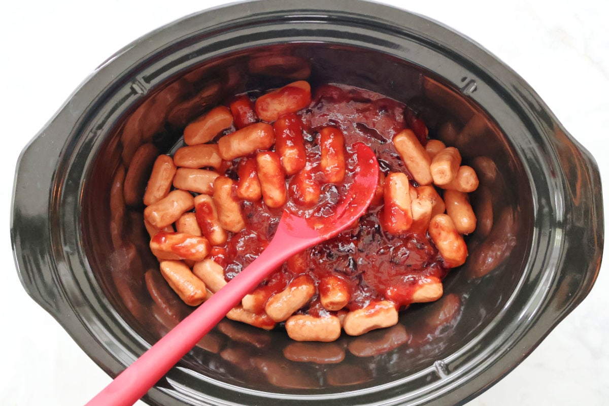 mix little sausages, grape jelly and hcili sauce prior to cooking.