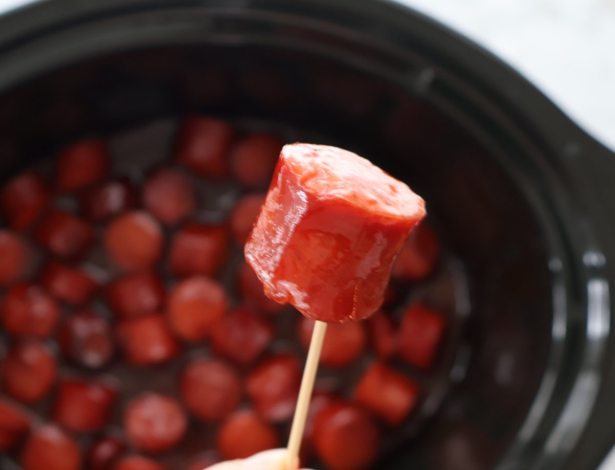 BBQ kielbasa served as an appetizer with toothpicks.