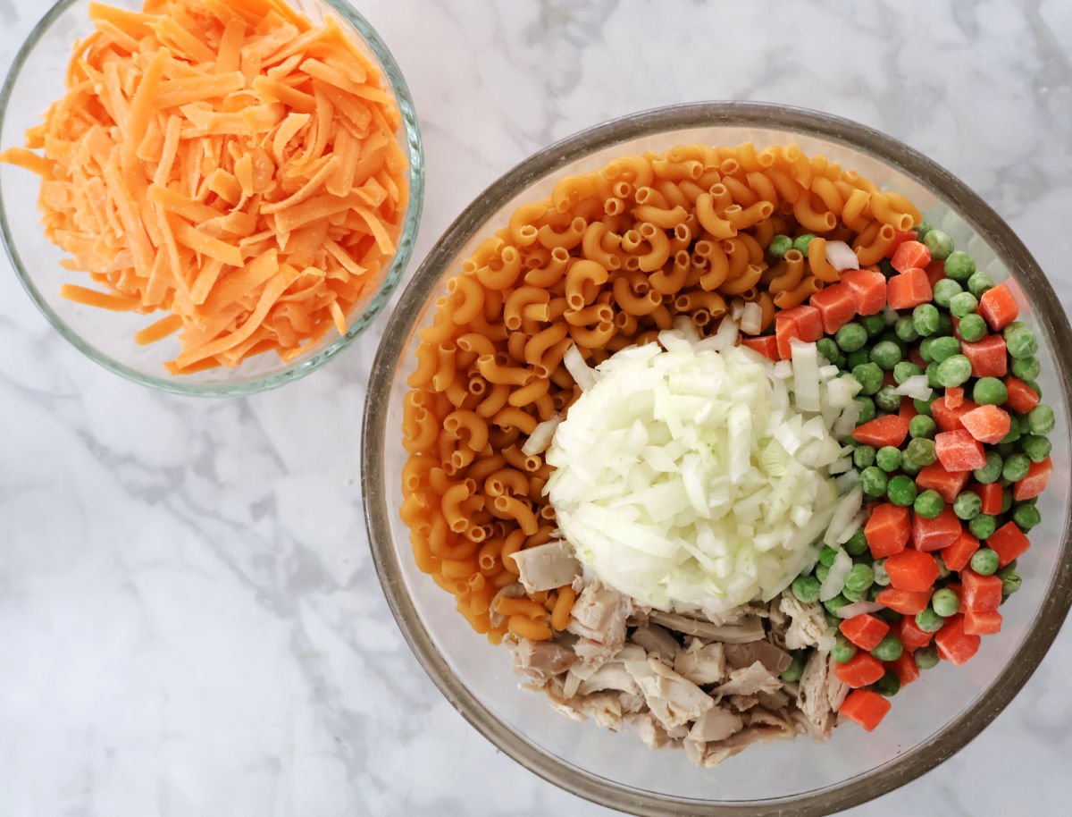 turkey noodle casserole ingredients in a large mixing bowl