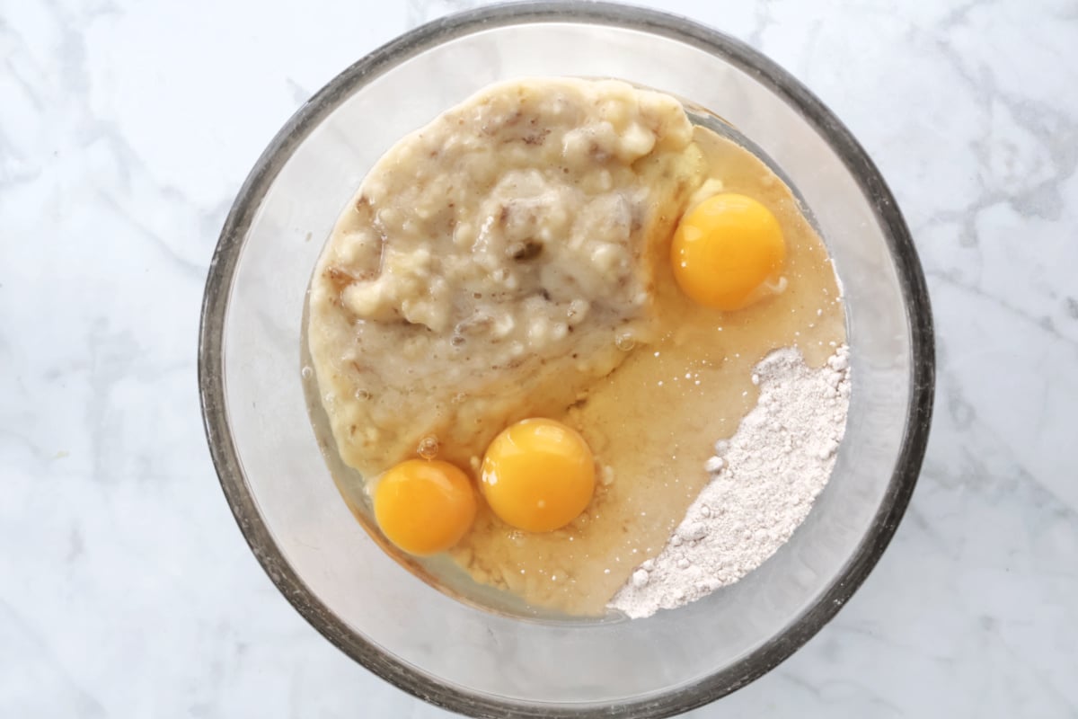 3 ingredients for banana cake mix including spice cake mix, eggs and mashed bananas.