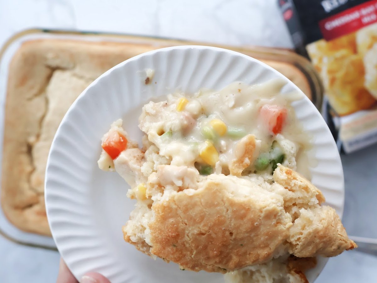 A delicious dump cake style chicken cobbler made with cooked chicken (rotisserie chicken works great). 