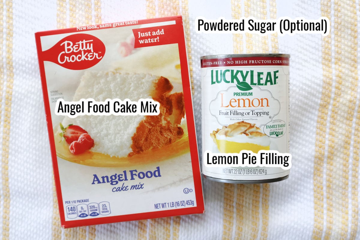 Angel food cake mix and lemon pie filling on kitchen counter for making two ingredient lemon bars.