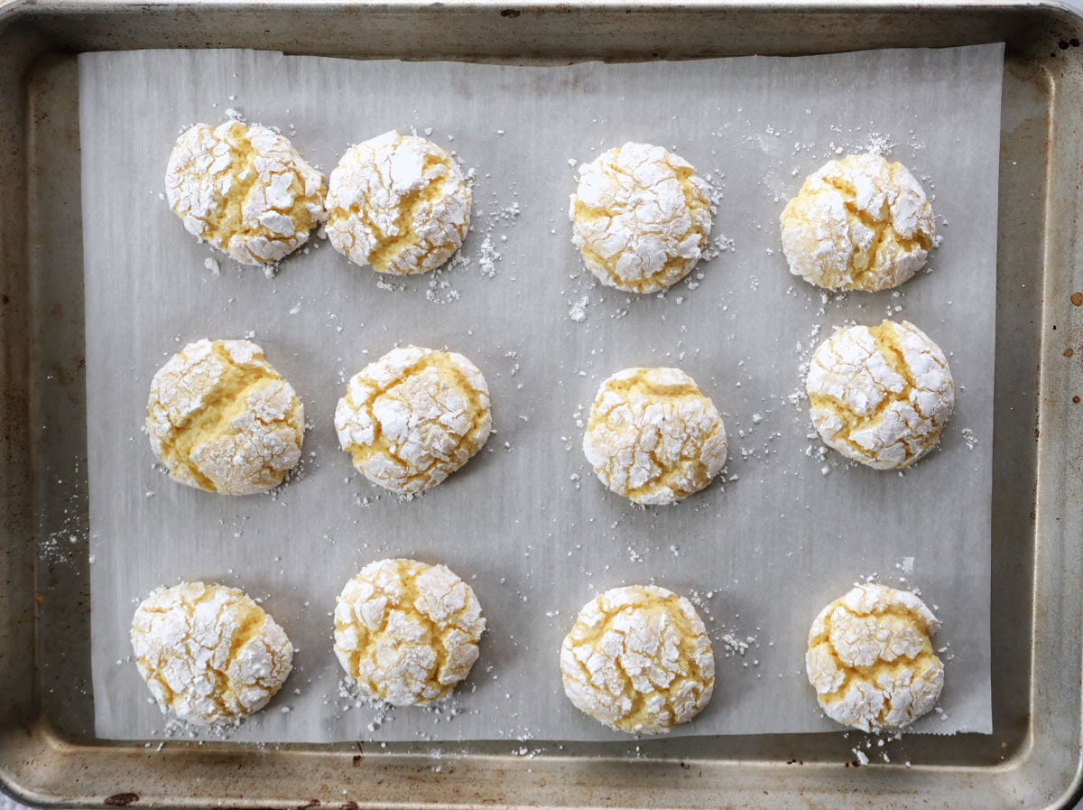 baked lemon crinkle cookies on a tray