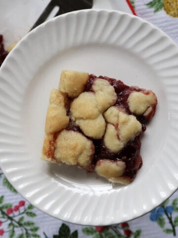 piece of raspberry bar on a plate
