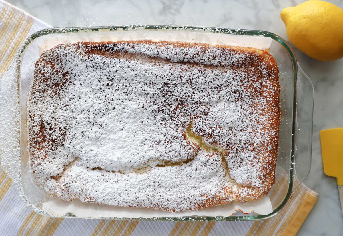 Easy 2 ingredient lemon bars made with angel food cake mix and lemon pie filling baked in a glass baking dish.