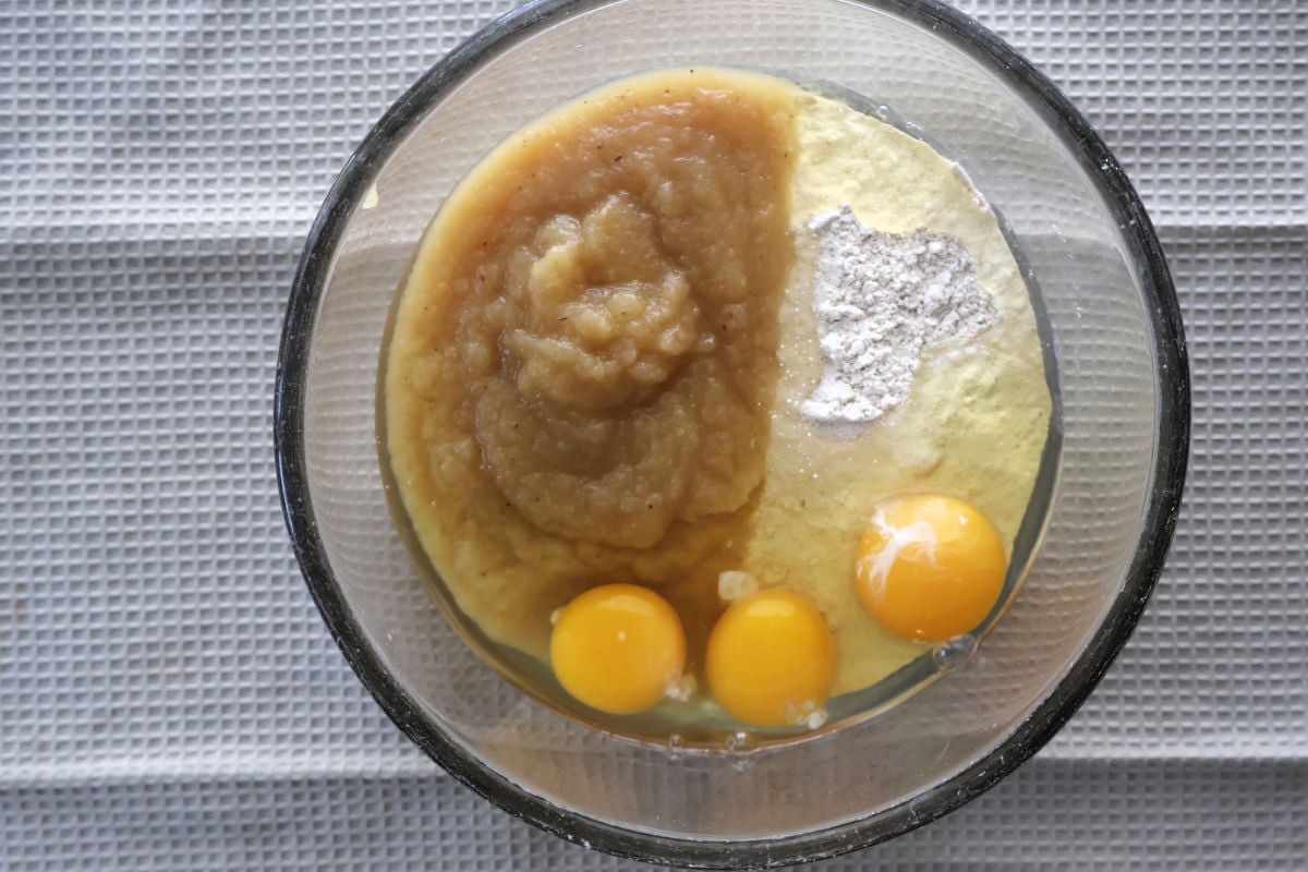 applesauce bundt cake ingredients in a bowl