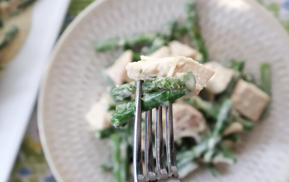 asparagus chicken skillet on a fork