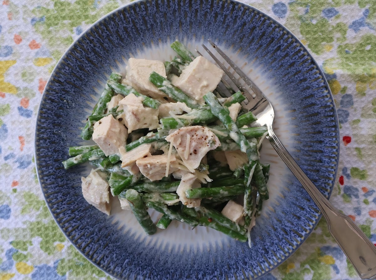 lemon asparagus skillet on a blue plate